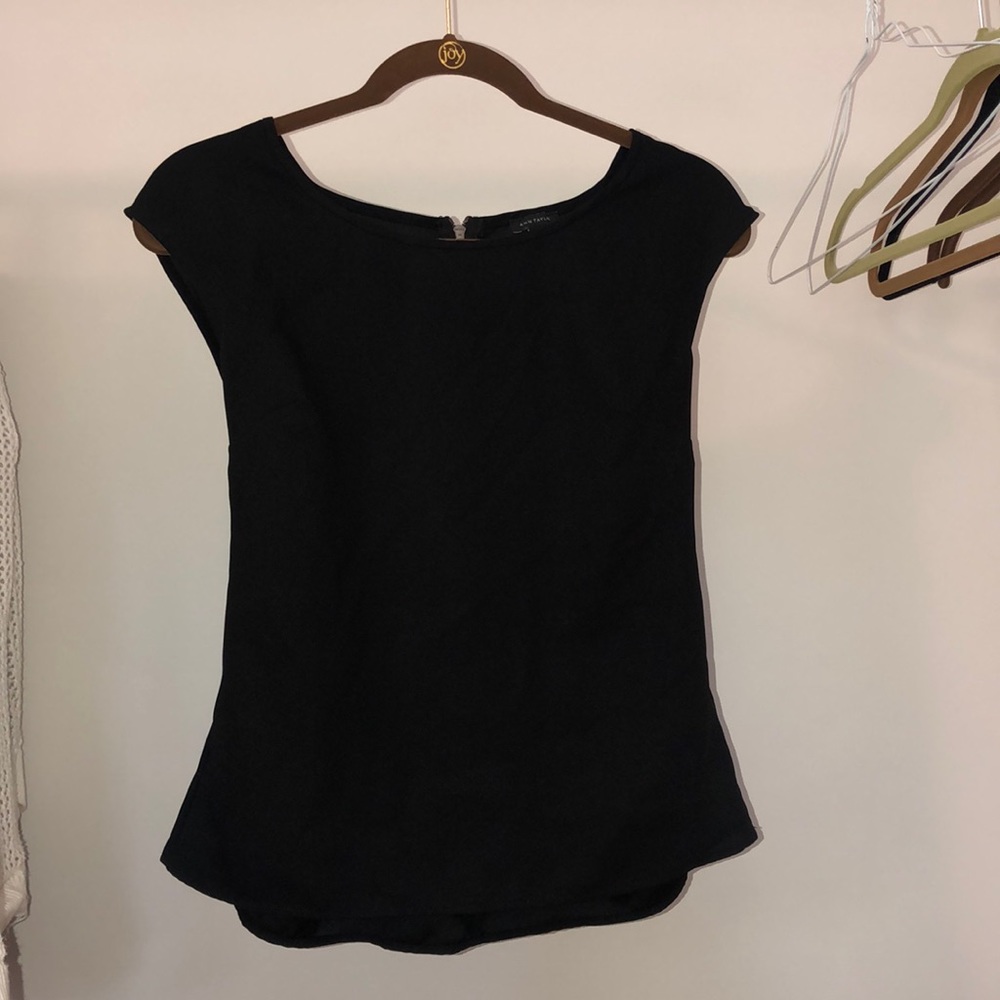 Ann Taylor black slight peplum top!